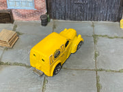 Hot Wheels Anglia Panel Truck yellow Express Delivery loose vehicle, top view