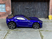 Hot Wheels Aston Martin One-77 V5651 metalflake grey loose car, right-side view