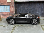 Hot Wheels Audi R8 in metallic charcoal — left side view