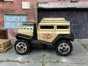 Hot Wheels Bad Mudder 2 tan L9935 loose car, left-side view
