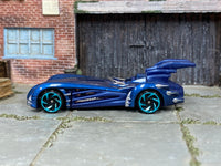 Hot Wheels Batman and Robin Batmobile metallic blue loose car, left side view