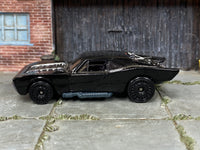 Hot Wheels Batmobile gloss black with black disc wheels — left side view