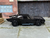 Hot Wheels Batmobile gloss black with black disc wheels — right side view