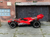 Hot Wheels Blade Raider red number 7 with black and gray graphics, left side view