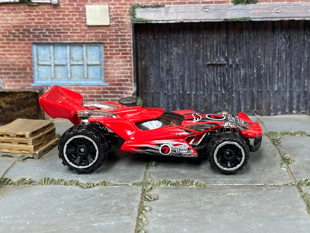 Hot Wheels Blade Raider red number 7 with black and gray graphics, right side view
