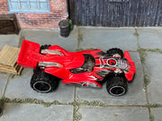 Hot Wheels Blade Raider red number 7 with black and gray graphics, top view