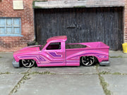 Hot Wheels Bounce'n Bass metallic pink with purple graphics, left side view