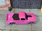 Hot Wheels Bounce'n Bass metallic pink with purple graphics, top view
