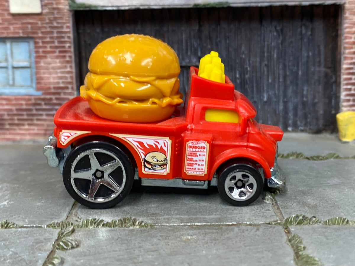 Hot Wheels Buns of Steel orange-red burger truck, right side view