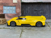 Hot Wheels Cadillac Project GTP Hypercar yellow 9, left-side view
