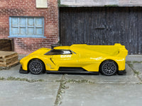 Hot Wheels Cadillac Project GTP Hypercar yellow 9, left-side view