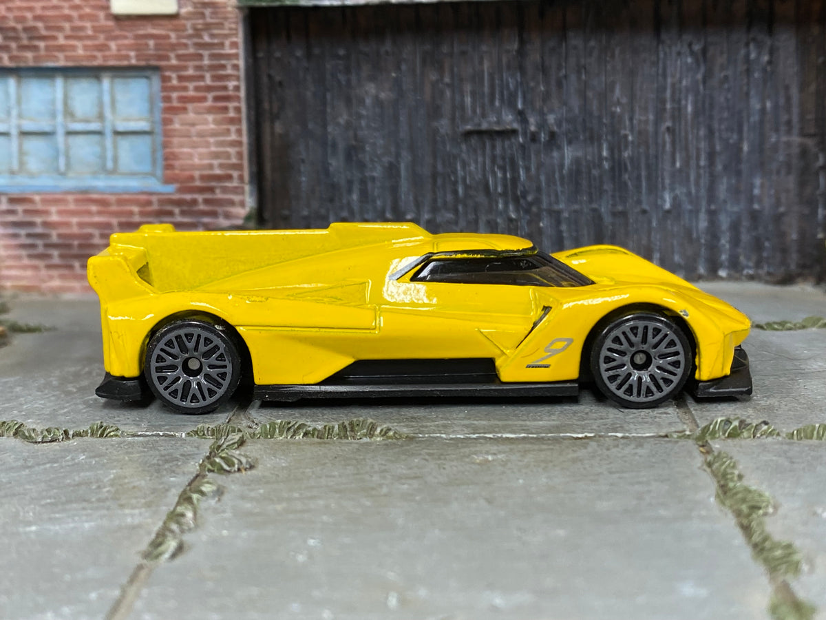 Hot Wheels Cadillac Project GTP Hypercar yellow 9, right-side view