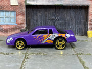 Hot Wheels Chevy Stocker purple skulls and flames loose car, left-side view