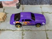 Hot Wheels Chevy Stocker purple skulls and flames loose car, top view