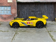 Hot Wheels Corvette C7.R yellow number 3 loose car, left-side view