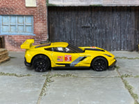 Hot Wheels Corvette C7.R yellow number 3 loose car, right-side view