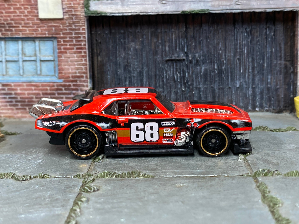 Hot Wheels Custom '68 Camaro red number 68 loose car, right-side view