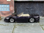 Hot Wheels Custom Corvette Convertible dark purple with five-spoke wheels, left side view