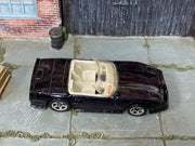 Hot Wheels Custom Corvette Convertible dark purple with five-spoke wheels, top view