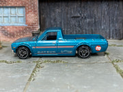Hot Wheels 1975 Datsun Sunny Truck B120 metallic teal 58 loose pickup, left side view