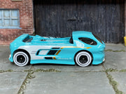 Hot Wheels Deora II turquoise and white loose car, right side view