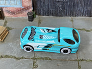 Hot Wheels Deora II turquoise and white loose car, top view