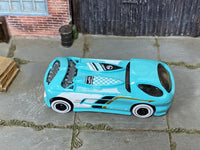 Hot Wheels Deora II turquoise and white loose car, top view