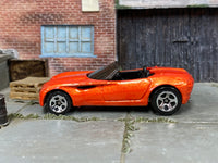 Metallic orange Hot Wheels Dodge Concept Car — left side view