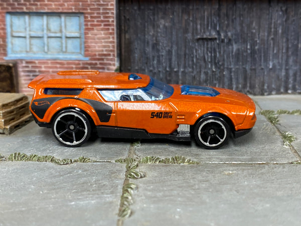 Hot Wheels Drift'n Break metallic orange, right side view with visible play wear