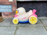 Hot Wheels Duck N' Roll Glow in the Duck pink and blue loose vehicle, left side view