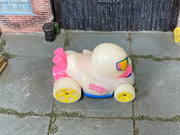 Hot Wheels Duck N' Roll Glow in the Duck pink and blue loose vehicle, top view