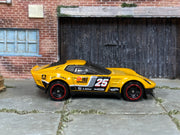 Hot Wheels El Segundo Coupe yellow number 25 loose car, left-side view