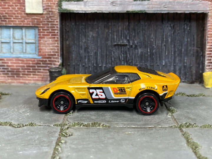 Hot Wheels El Segundo Coupe yellow number 25 loose car, right-side view