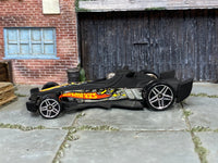 2004 Hot Wheels F-Racer matte black B3531 First Editions loose car, right-side view
