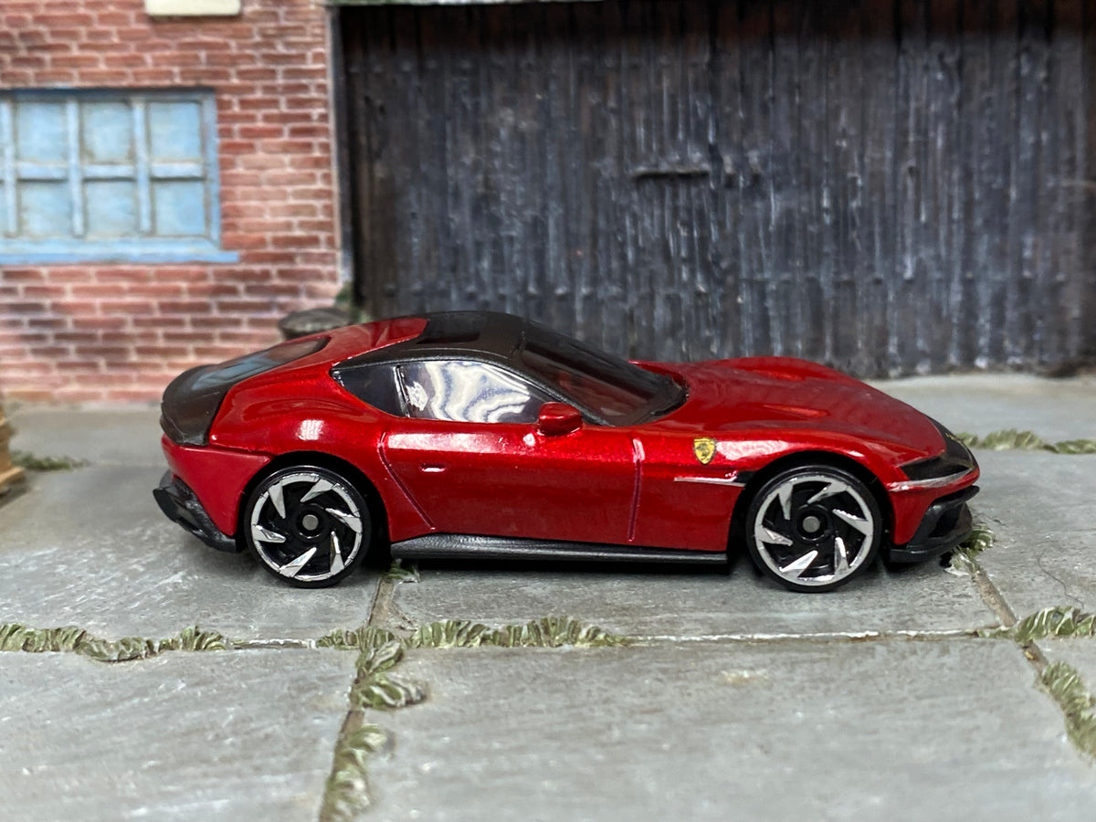 Hot Wheels Ferrari 12Cilindri metallic red with black roof, right side view