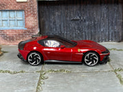 Hot Wheels Ferrari 12Cilindri metallic red with black roof, right side view