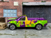 Hot Wheels Ford F-Series CNG Pickup purple and green loose die-cast, left-side view