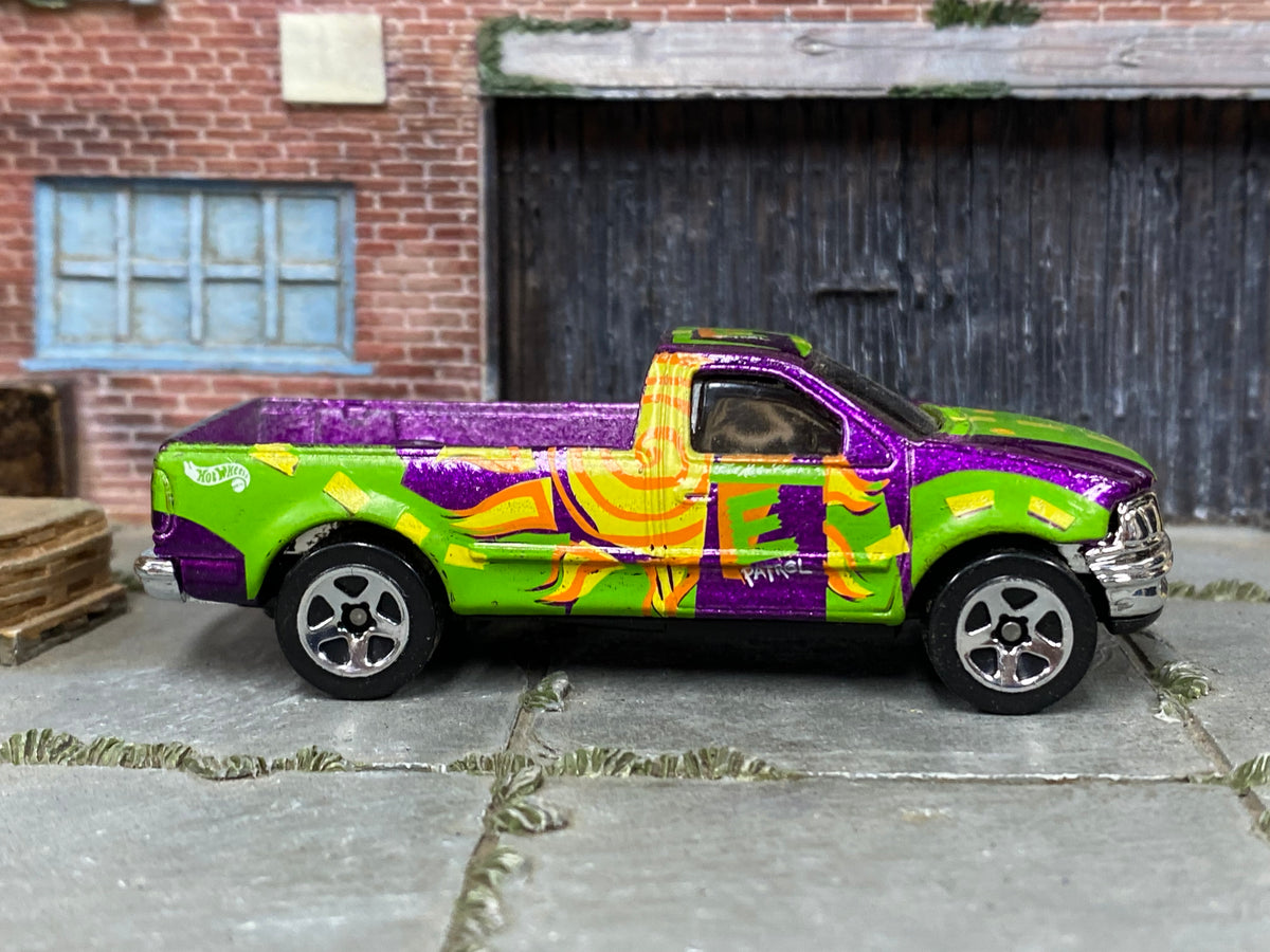 Hot Wheels Ford F-Series CNG Pickup purple and green loose die-cast, right-side view