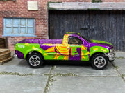 Hot Wheels Ford F-Series CNG Pickup purple and green loose die-cast, right-side view