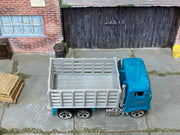 Hot Wheels Ford Stake Bed Truck teal cab and gray bed, top view