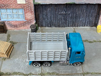 Hot Wheels Ford Stake Bed Truck teal cab and gray bed, top view