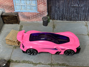Hot Wheels Gazella R in pink and purple, top view of loose car