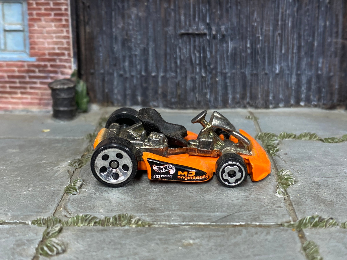 Hot Wheels orange MJ Engineering Go Kart loose toy, right side view