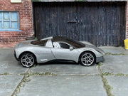 Silver Hot Wheels Gordon Murray Automotive T.33, right-side view of loose car