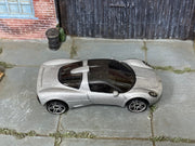 Silver Hot Wheels Gordon Murray Automotive T.33, top view of loose car