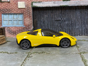 Yellow Hot Wheels Gordon Murray Automotive T.33 loose car, right side view