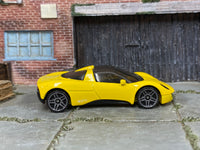 Yellow Hot Wheels Gordon Murray Automotive T.33 loose car, right side view