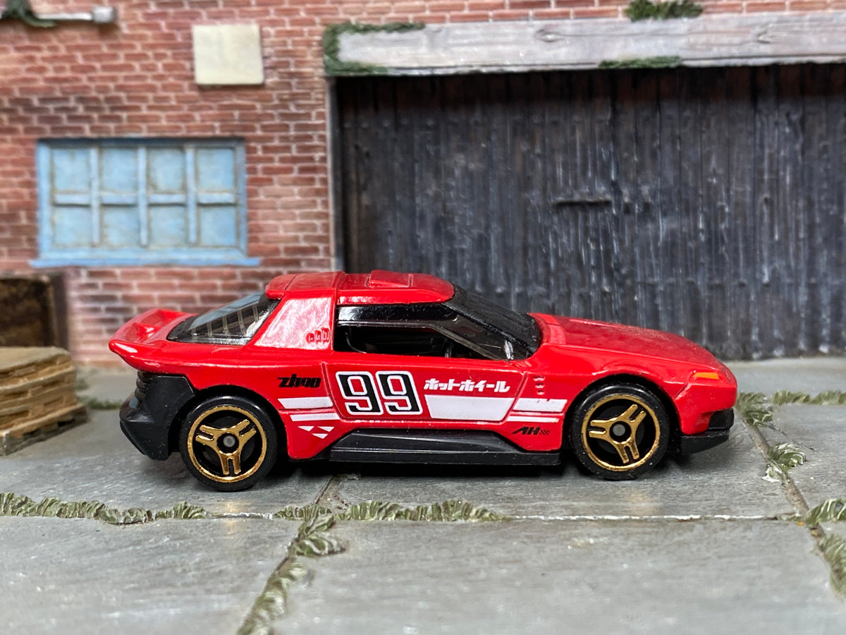 Red number 99 Hot Wheels Hako Type D loose car, right side view