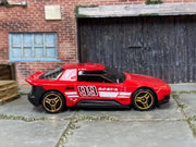 Red number 99 Hot Wheels Hako Type D loose car, right side view