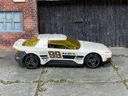 Hot Wheels Hako Type D pearl white number 99 with yellow windows, right side view